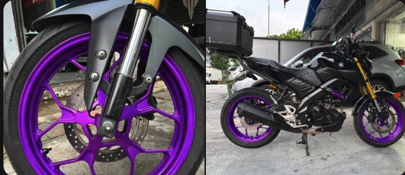 Customer's motorcycle with purple sprayed rims, photo from Ahmad Dini's Google review